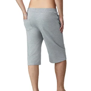 Men s Knee-Length Shorts with Elastic Waistband and Drawstring Loose Fit Solid Color Hip Hop Style Long Shorts with Pockets